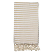 A beige and white striped Turkish towel with fringes at the bottom edge.