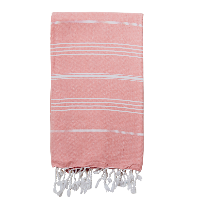 A pink/peony Turkish towel with white stripes and tassels on the end, displayed on a white background.