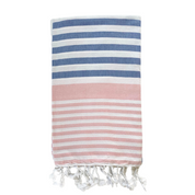 A folded blue, pink and white striped Sofia Turkish towel
